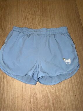 GOAT USA Women's Athletic Shorts in Carolina Blue small goat graphic on the leg
